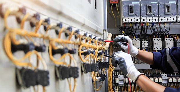 Professional Electrician technician working in Red Oak, IA